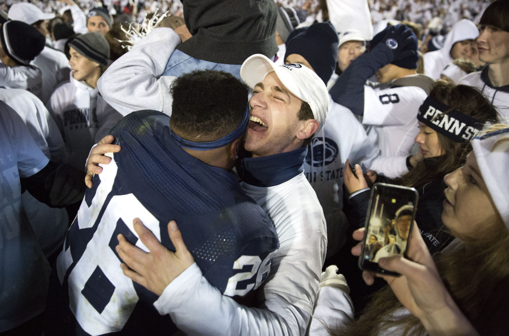 Barkley hugs student